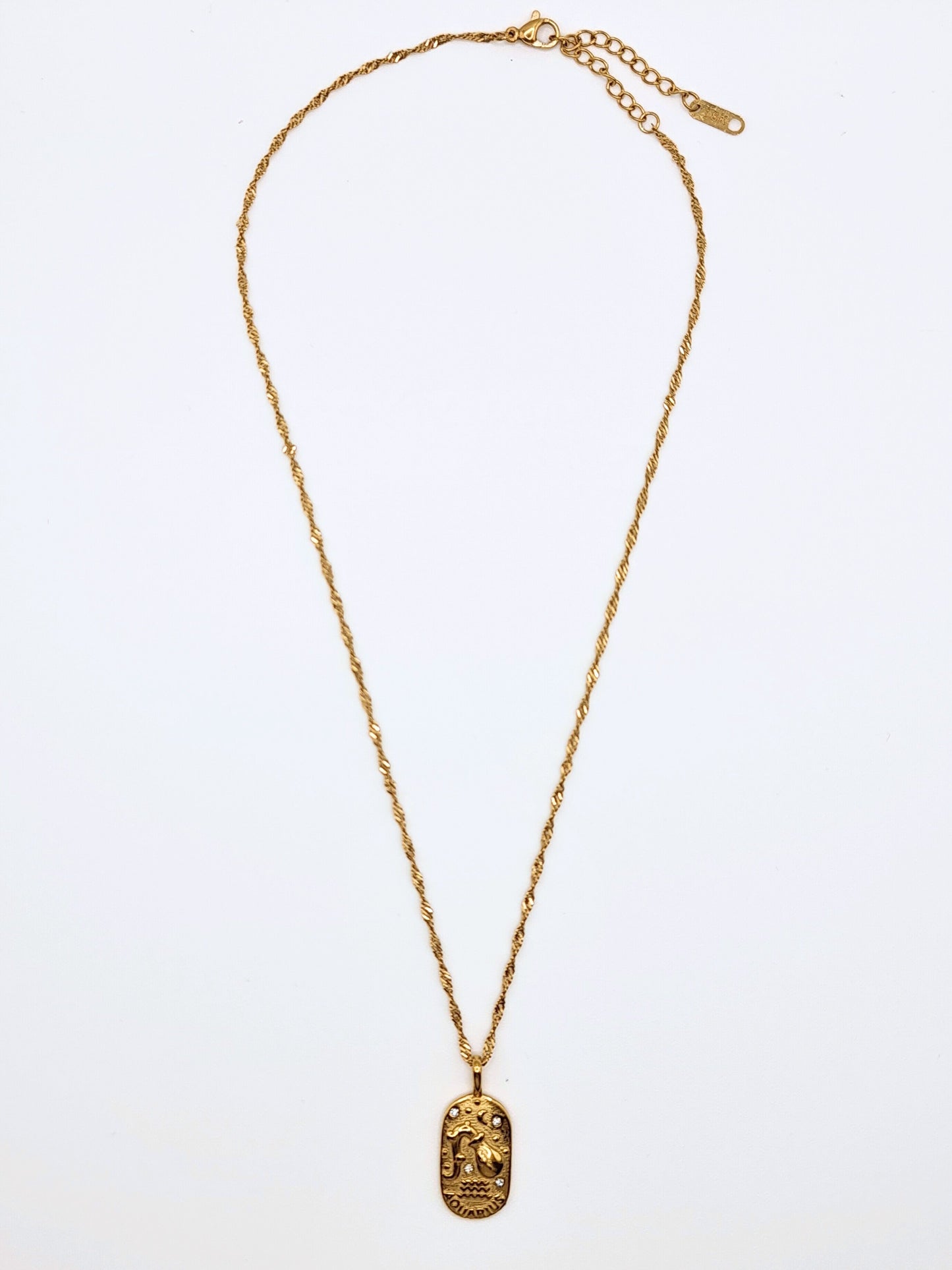 The Kiki Aquarius 18k Gold Plated Stainless Steel Zodiac Starsign Crystal Necklace.
