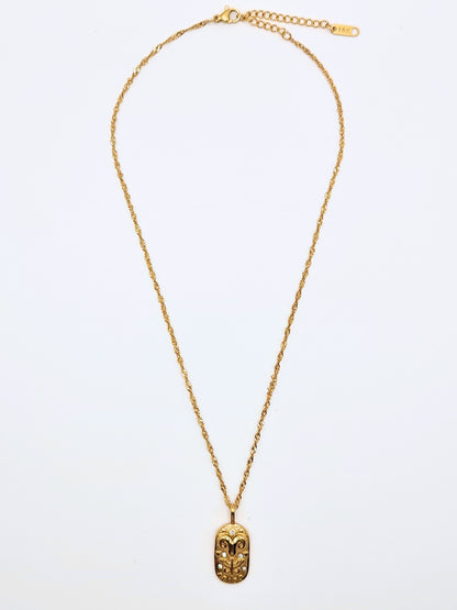 The Kiki Aries 18k Gold Plated Stainless Steel Zodiac Starsign Crystal Necklace.