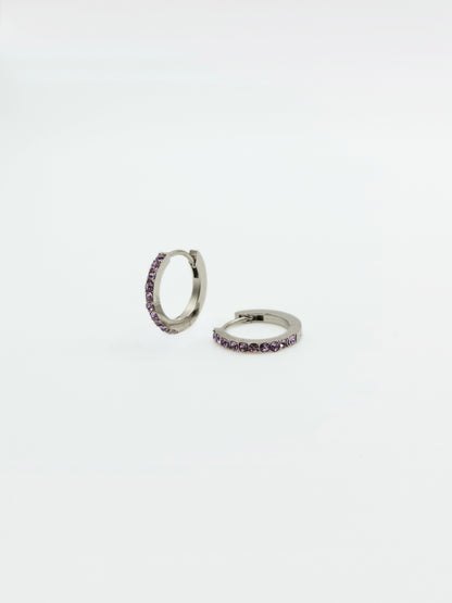 The Maija 'February' Amethyst Birthstone Silver Finish Tarnish Free Crystal Huggie Hoop Earrings.