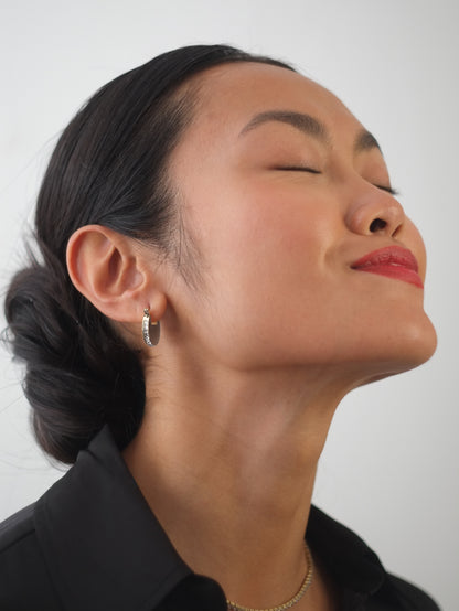 The Discus Silver Finish Tarnish-Free Crystal Disc Hoop Earrings