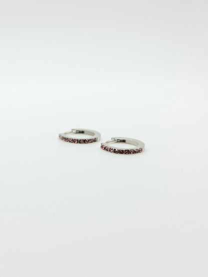 The Maija 'June' Alexandrite Birthstone Silver Finish Tarnish Free Crystal Huggie Hoop Earrings.