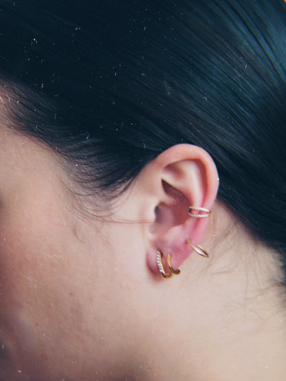 The Illusion 18k Gold Plated Stainless Steel Pave Crystal Double Hoop Earrings.