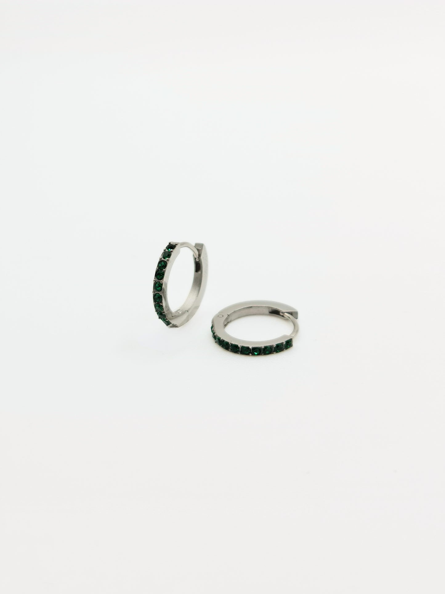 The Maija 'May' Emerald Birthstone Silver Finish Tarnish Free Crystal Huggie Hoop Earrings.