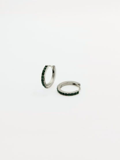The Maija 'May' Emerald Birthstone Silver Finish Tarnish Free Crystal Huggie Hoop Earrings.