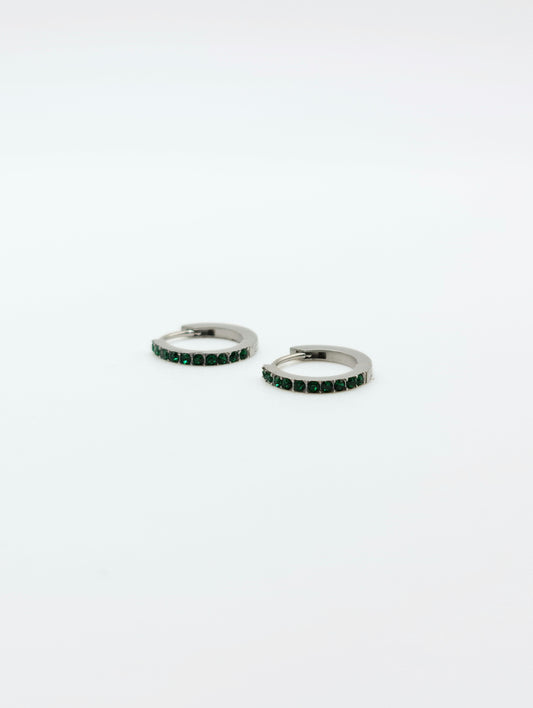 The Maija 'May' Emerald Birthstone Silver Finish Tarnish Free Crystal Huggie Hoop Earrings.