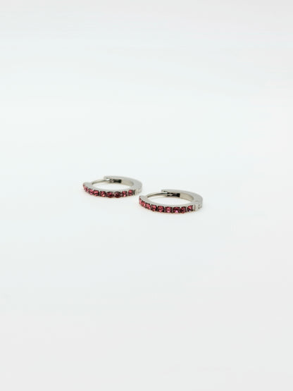 The Maija 'October' Tourmaline Birthstone Silver Finish Tarnish Free Crystal Huggie Hoop Earrings.