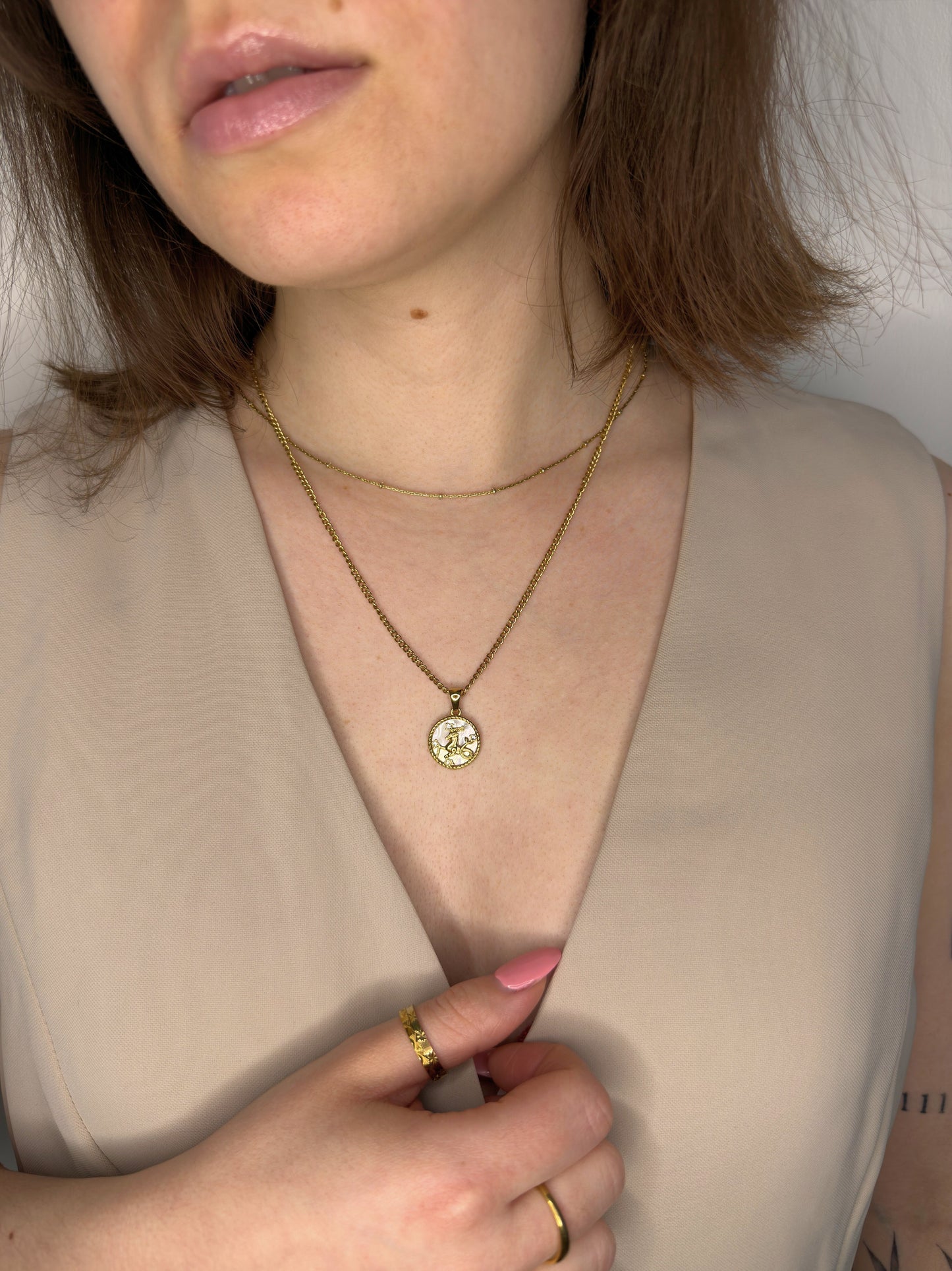 The Blair Capricorn 18k Gold Plated Stainless Steel Zodiac Starsign Pearlescent Necklace.