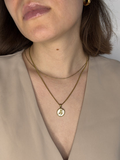 The Blair Virgo 18k Gold Plated Stainless Steel Zodiac Starsign Pearlescent Necklace.