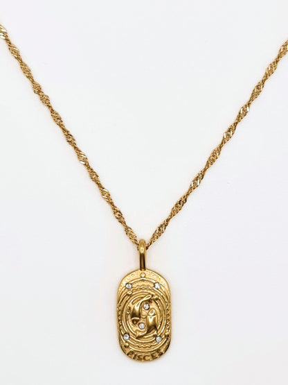 The Kiki Pisces 18k Gold Plated Stainless Steel Zodiac Starsign Crystal Necklace.