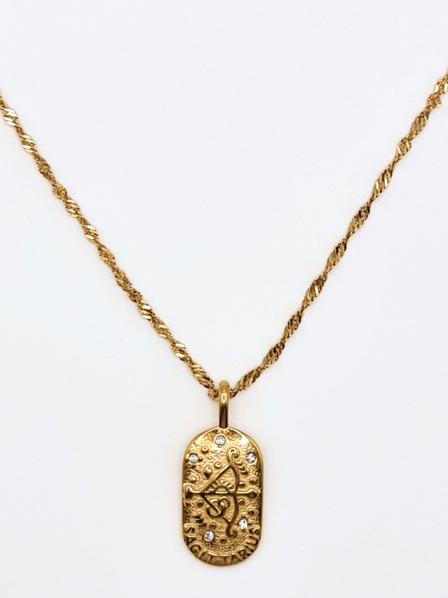The Kiki Sagittarius 18k Gold Plated Stainless Steel Zodiac Starsign Crystal Necklace.