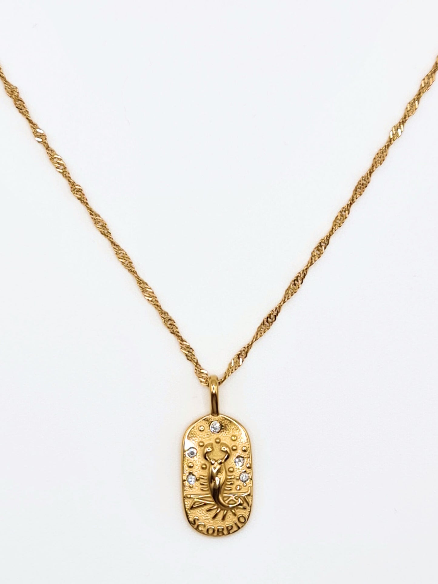 The Kiki Scorpio 18k Gold Plated Stainless Steel Zodiac Starsign Crystal Necklace.