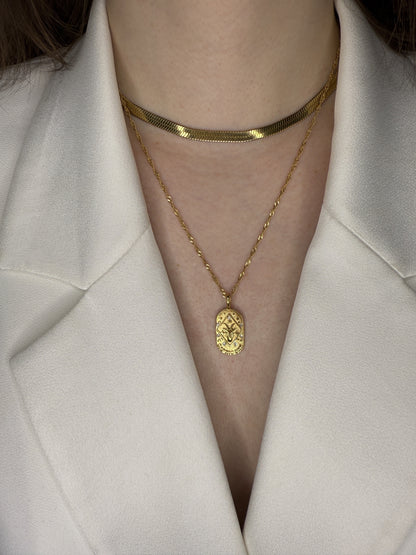 The Kiki Capricorn 18k Gold Plated Stainless Steel Zodiac Starsign Crystal Necklace.