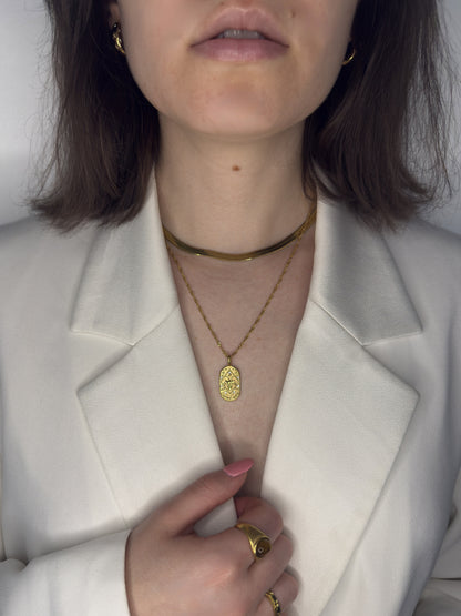 The Kiki Capricorn 18k Gold Plated Stainless Steel Zodiac Starsign Crystal Necklace.