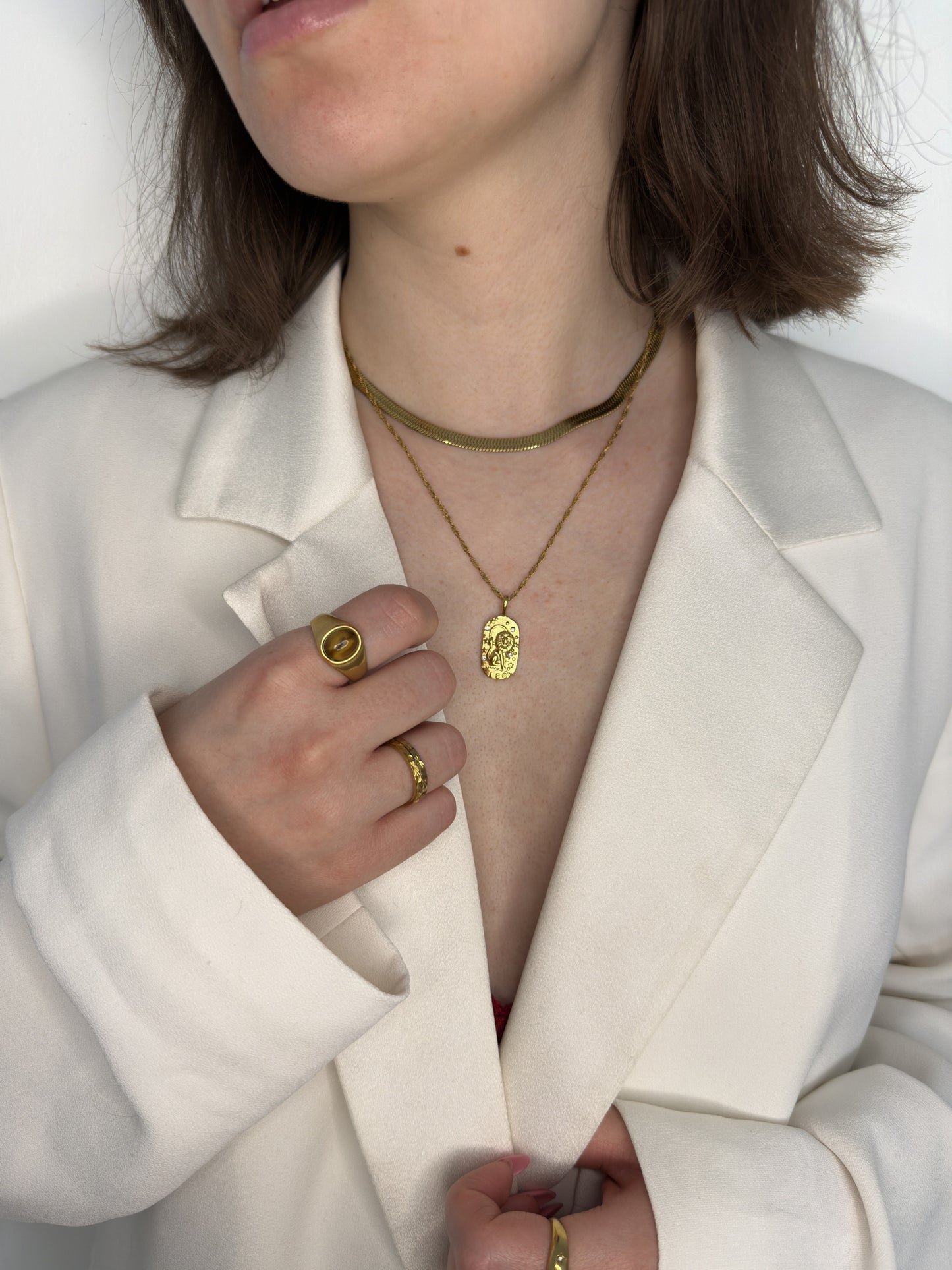 The Kiki Leo 18k Gold Plated Stainless Steel Zodiac Starsign Crystal Necklace.