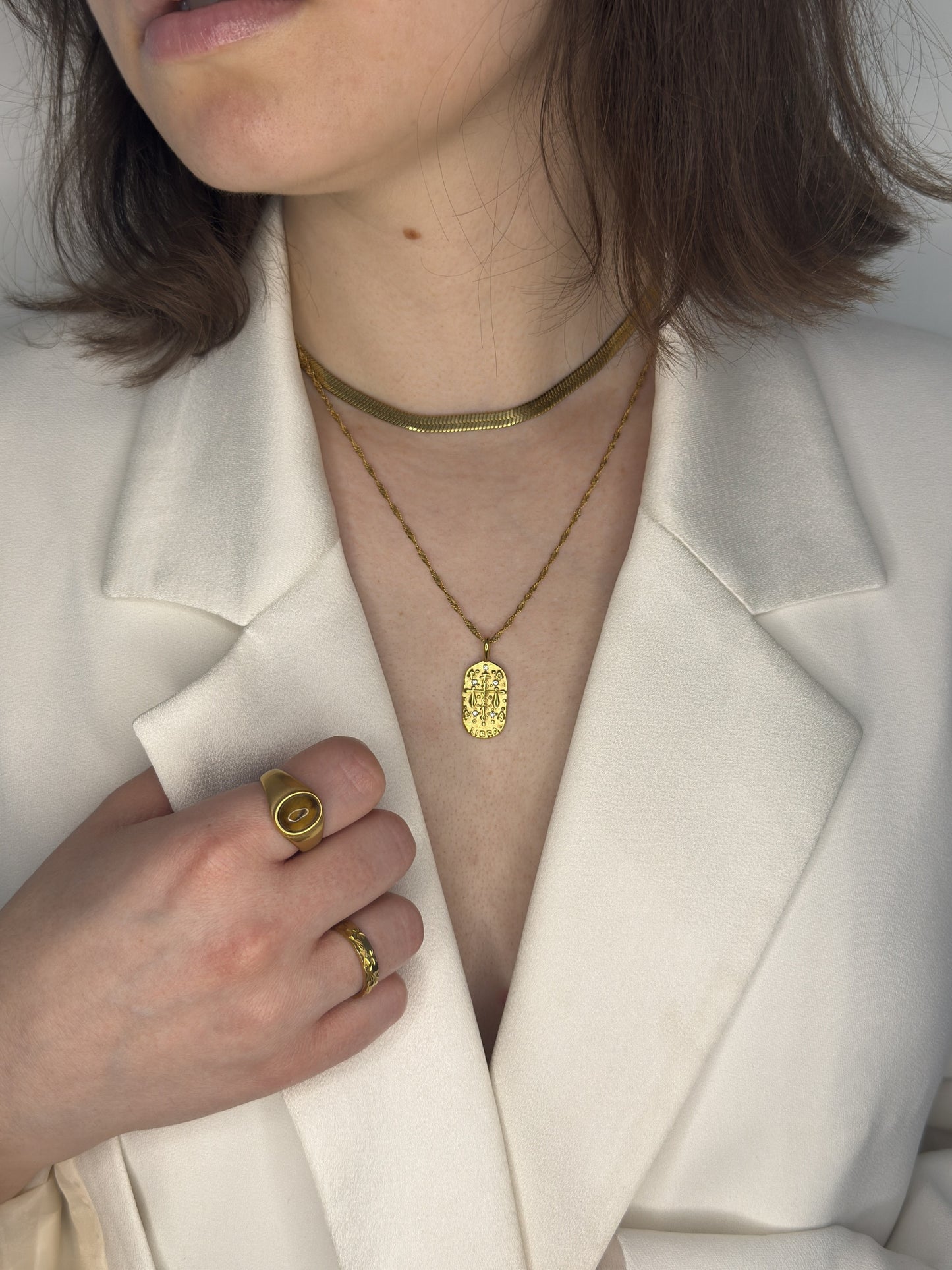 The Kiki Libra 18k Gold Plated Stainless Steel Zodiac Starsign Crystal Necklace.