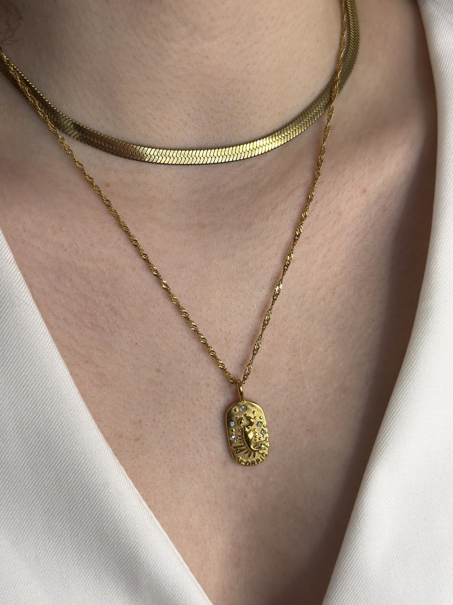 The Kiki Scorpio 18k Gold Plated Stainless Steel Zodiac Starsign Crystal Necklace.