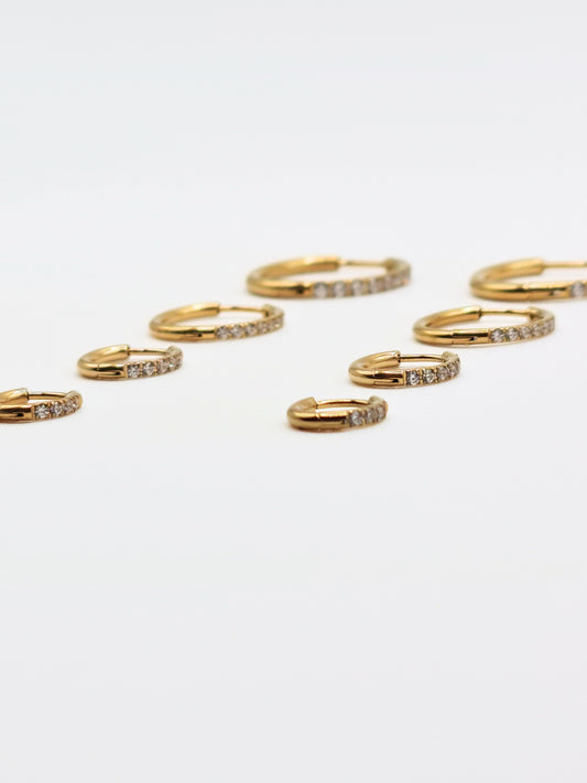The Alaia Essentials 18k Gold Plated Tarnish-Free Crystal Pave Huggie Hoop Earrings in 6mm