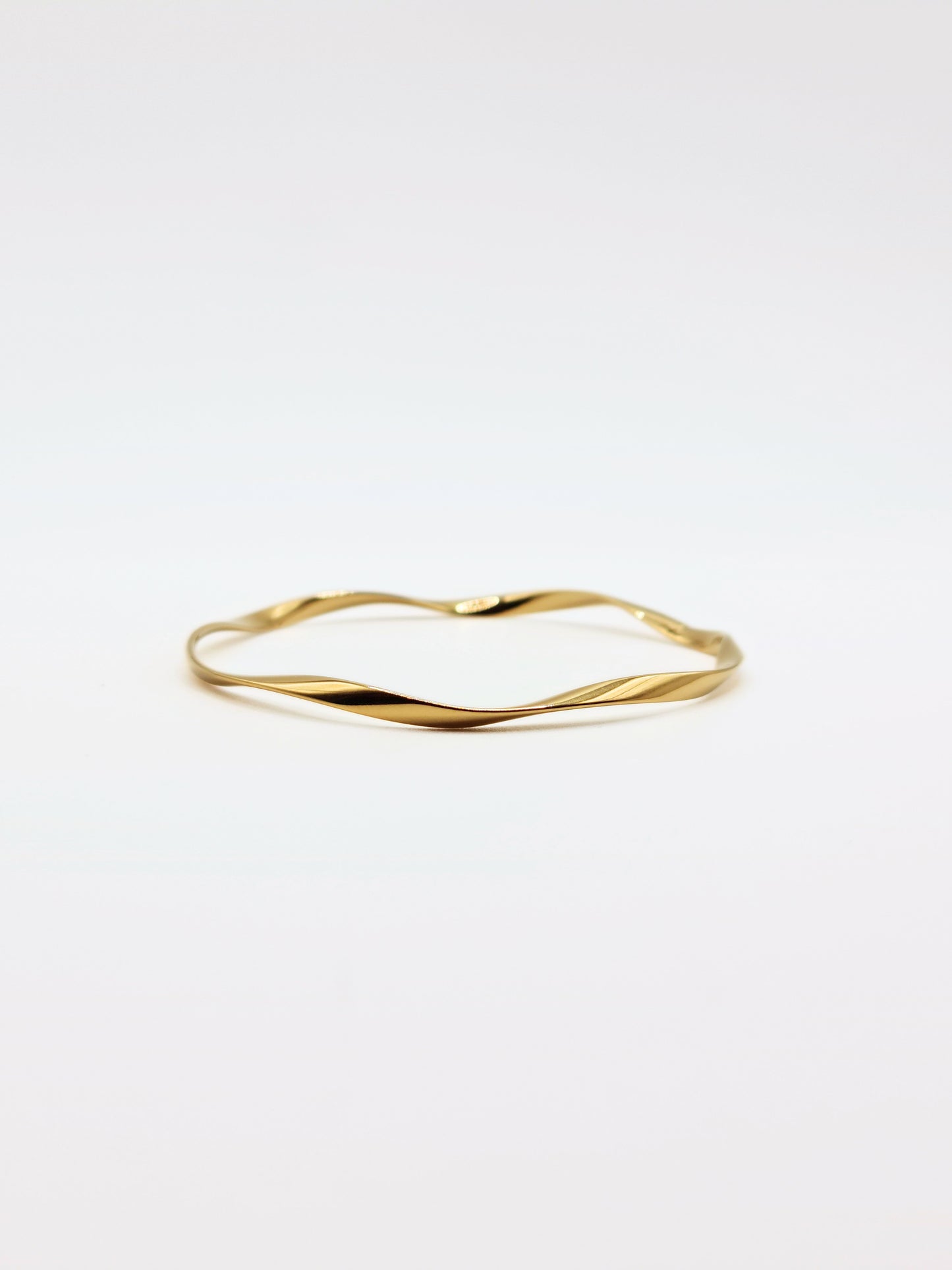 The Wesley 18k Gold Plated Tarnish-Free Wavey Twist Fine Bangle Bracelet