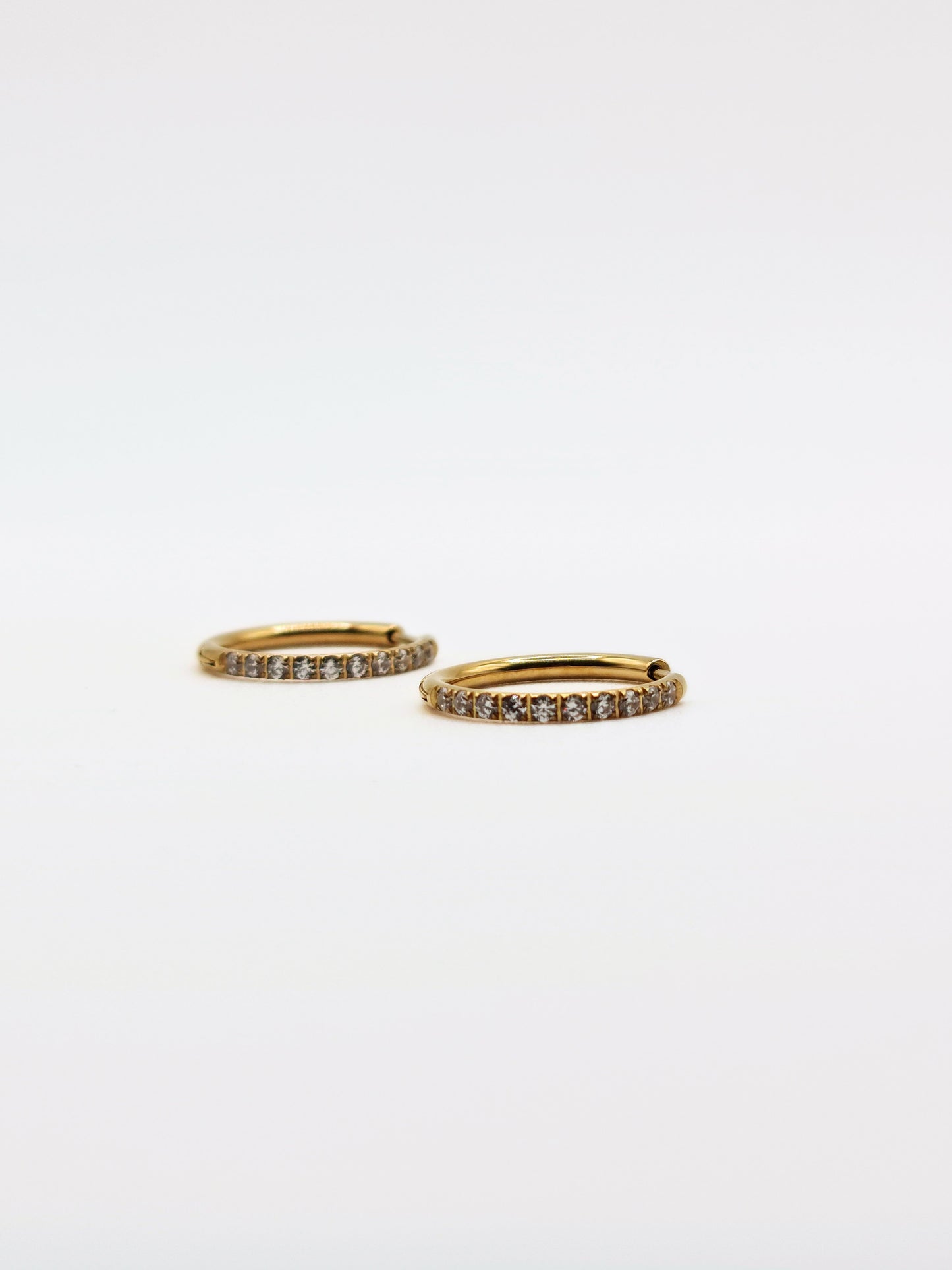 The Alaia Essentials 18k Gold Plated Tarnish-Free Crystal Pave Hoop Earrings in 16mm