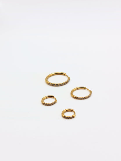 The Alaia Essentials 18k Gold Plated Tarnish-Free Crystal Pave Huggie Hoop Earrings in 12mm