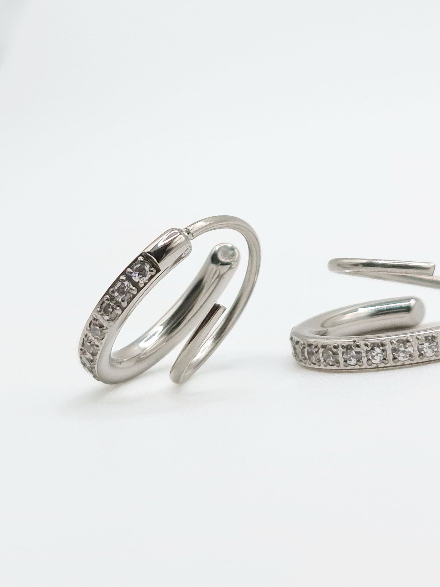 The Spiral Silver Finish Tarnish-Free Crystal Pave Double Hoop Earrings