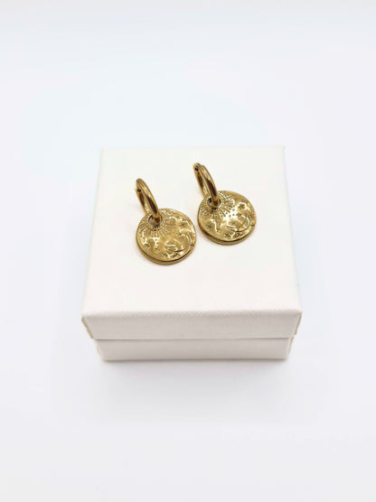 The Gia 18k Gold Plated Stainless Steel Celestial Disk Drop Hoop Earrings.