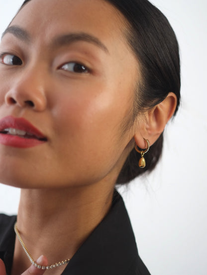 The Orbital 18k Gold Plated Tarnish-Free Ball Drop Pave Hoop Earrings