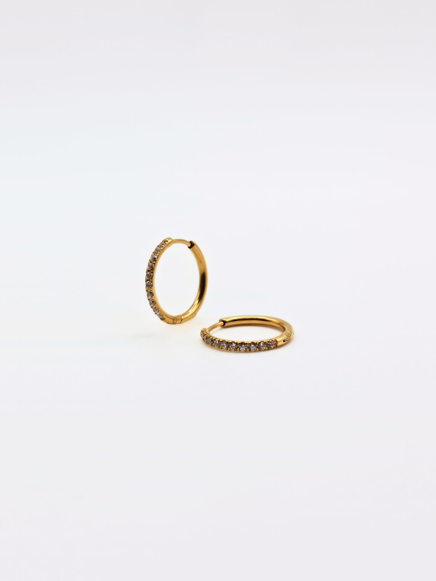 The Alaia Essentials 18k Gold Plated Tarnish-Free Crystal Pave Hoop Earrings in 16mm