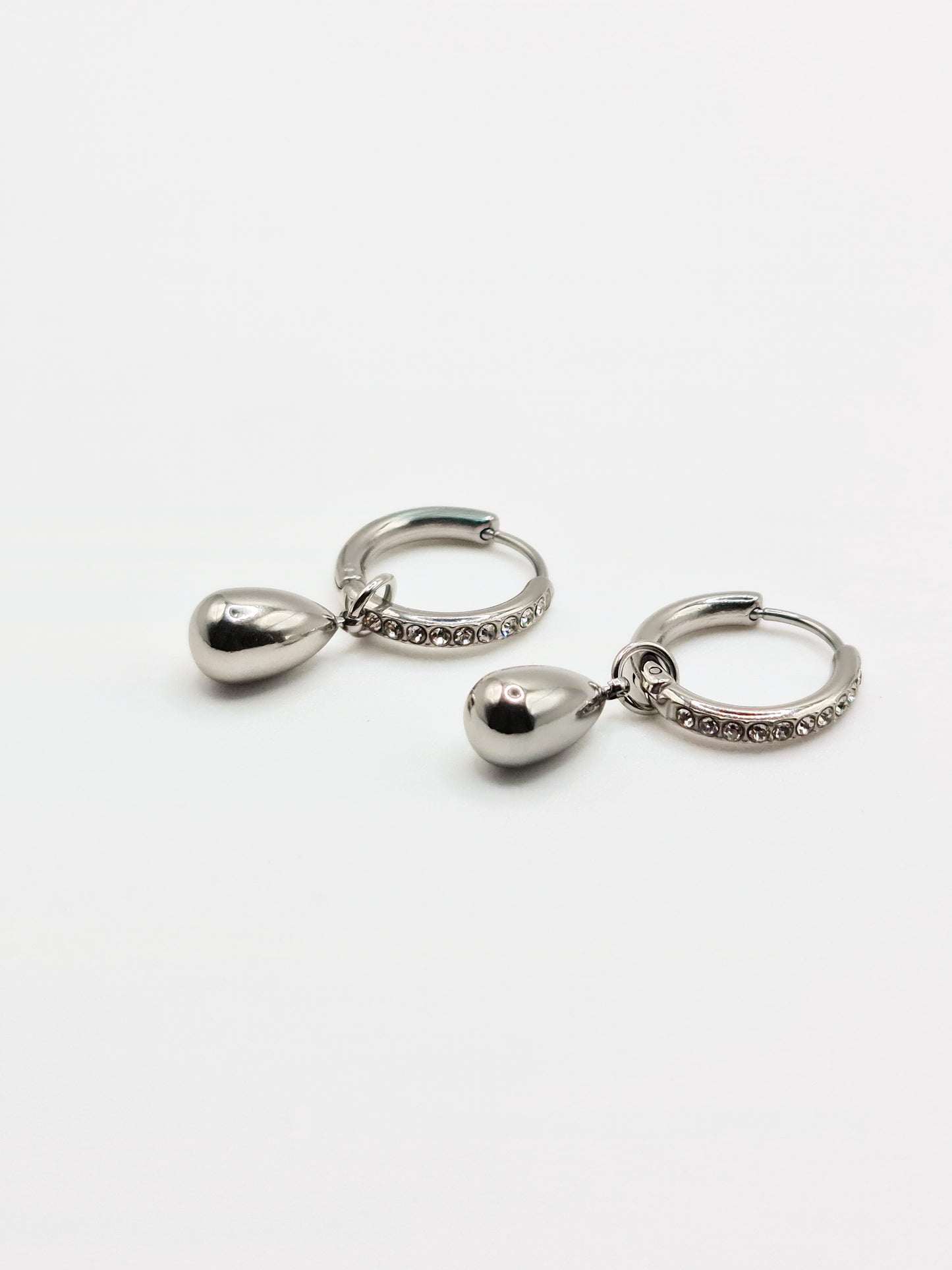 The Orbital Silver Finish Tarnish-Free Ball Drop Pave Hoop Earrings
