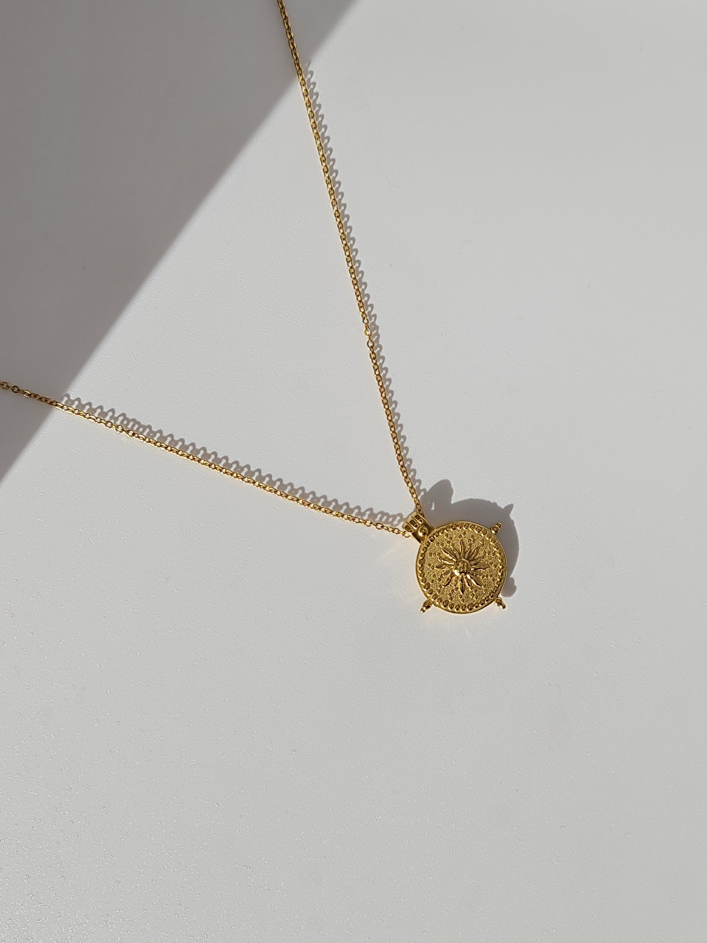 The Talisman Collection 18k Gold Plated Stainless Steel Compass Pendant Necklace.