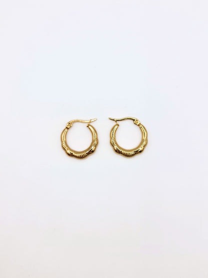 The Ashley 18k Gold Plated Stainless Steel Twist Etched Hoop Earrings.