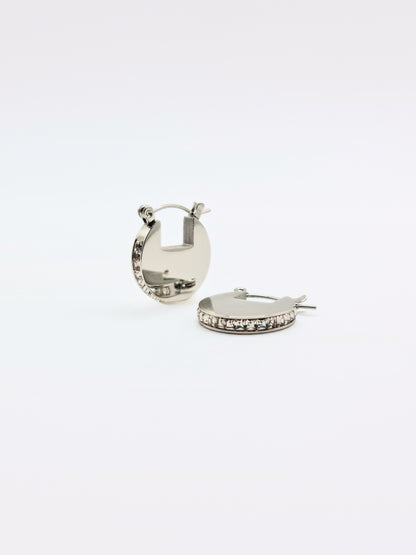 The Discus Silver Finish Tarnish-Free Crystal Disc Hoop Earrings