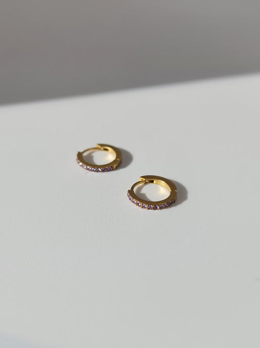 The Maija 'February' Amethyst Birthstone 18k Gold Plated Stainless Steel Crystal Huggie Hoop Earrings.