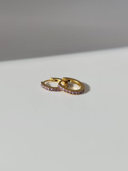 The Maija 'February' Amethyst Birthstone 18k Gold Plated Stainless Steel Crystal Huggie Hoop Earrings.