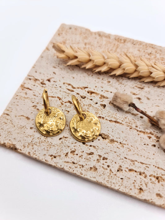 The Gia 18k Gold Plated Stainless Steel Celestial Disk Drop Hoop Earrings.