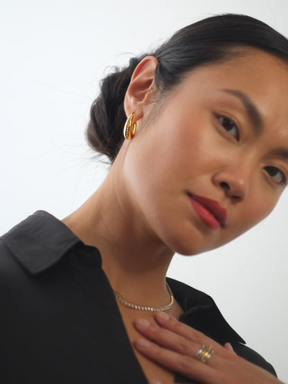 The Ovatus 18k Gold Plated Tarnish-Free Crystal Pave Oval Hoop Earrings