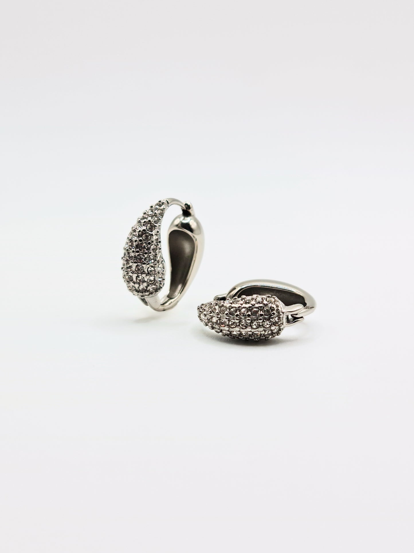 The Corinthos Silver Finish Tarnish-Free Crystal Pave Abstract Hoop Earrings