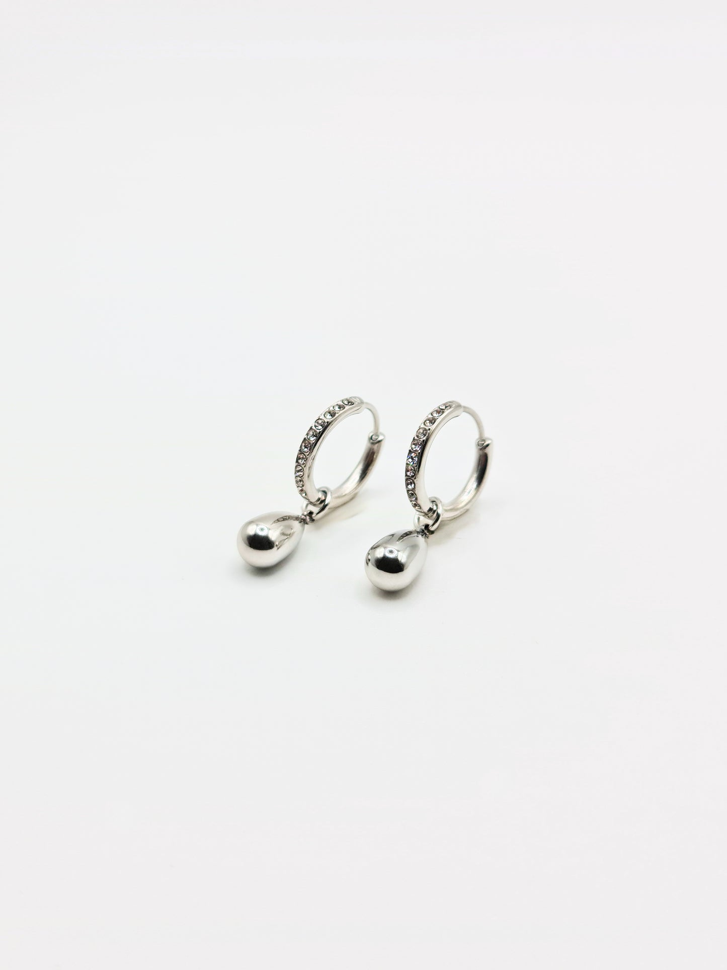The Orbital Silver Finish Tarnish-Free Ball Drop Pave Hoop Earrings