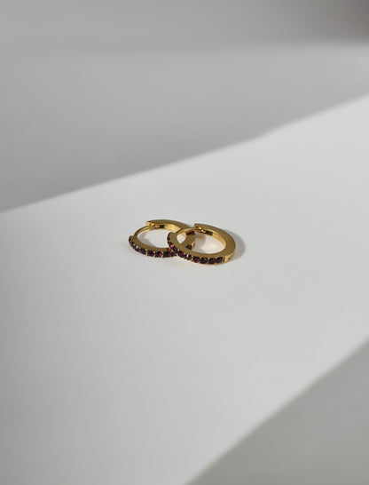 The Maija 'July' Ruby Birthstone 18k Gold Plated Stainless Steel Crystal Huggie Hoop Earrings.