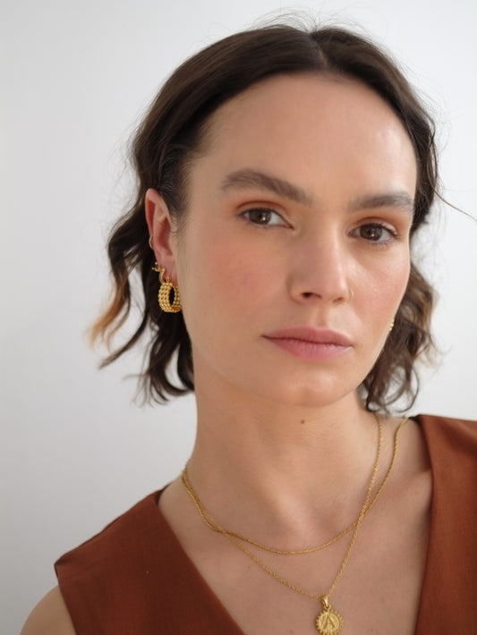 The Bali Collection 18k Gold Plated Stainless Steel Beaded Hoop Earrings.
