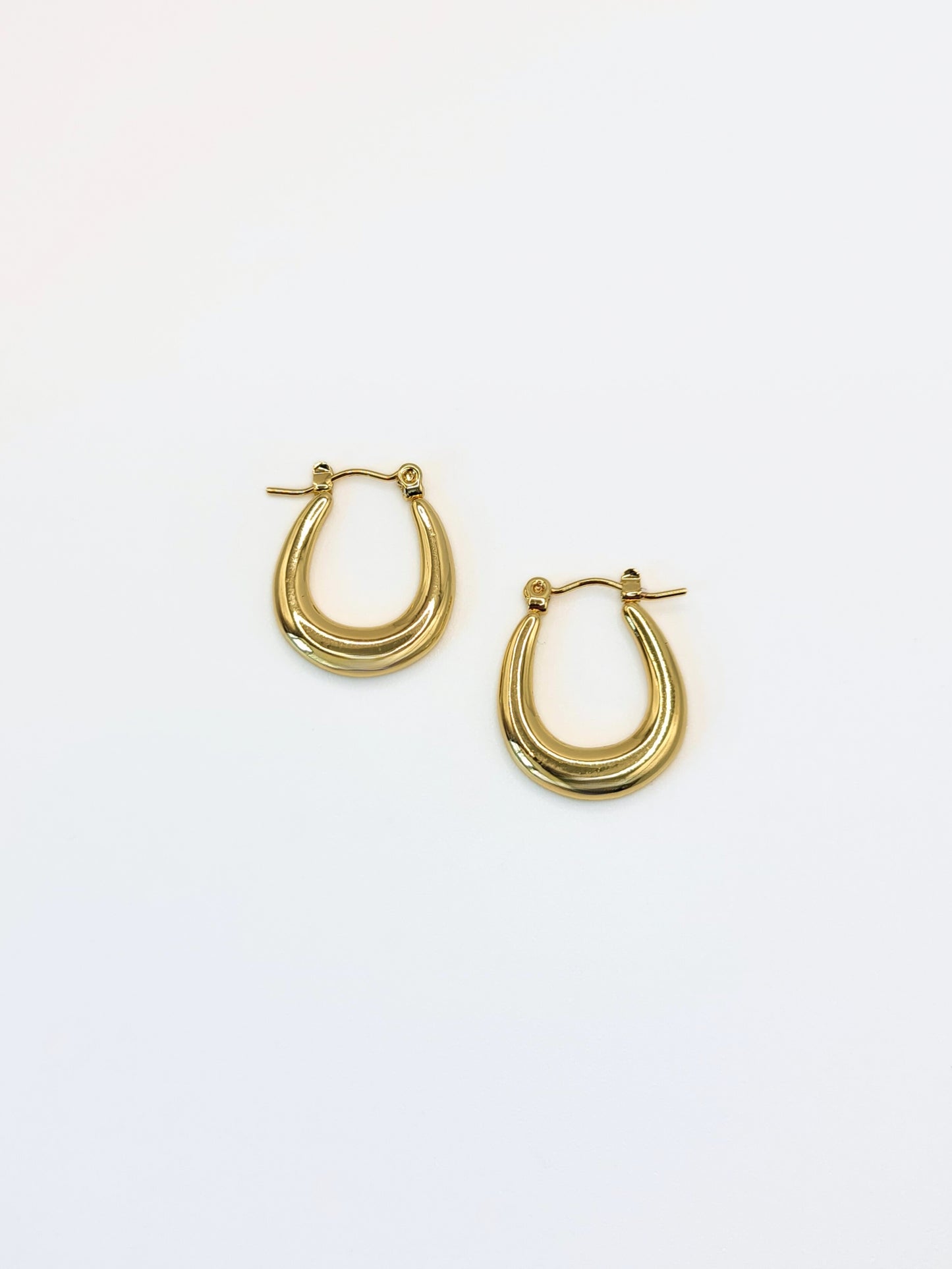 The Duke 18k Gold Plated Stainless Steel Oval Hoop Earrings.