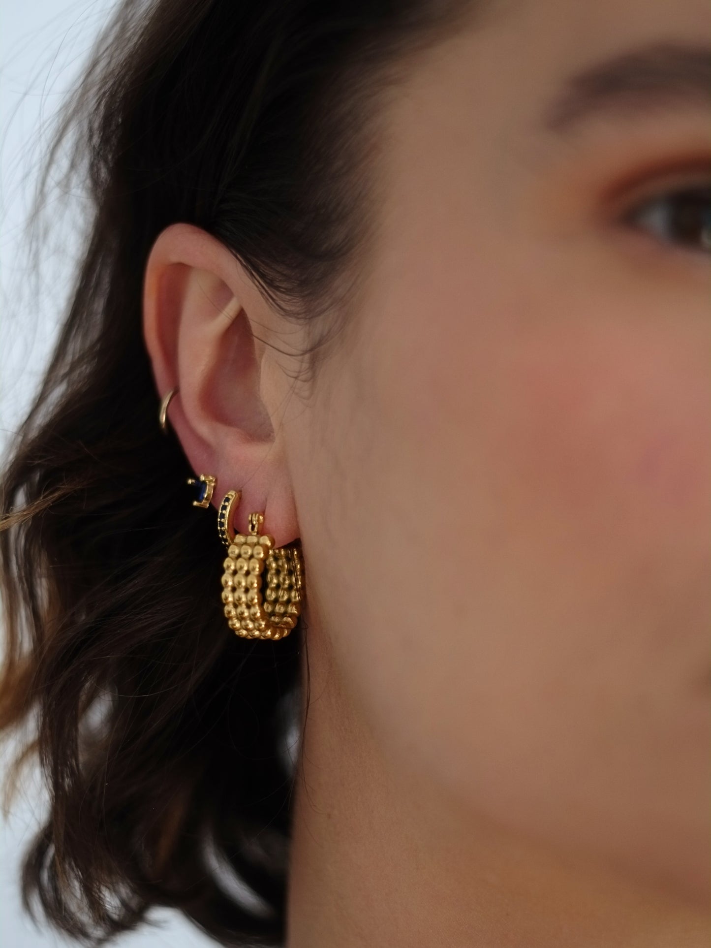 The Talisman Collection 18k Gold Plated Stainless Steel Beaded Hoop Earrings.