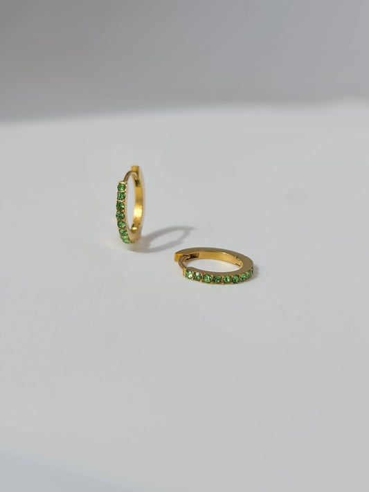 The Maija 'August' Peridot Birthstone 18k Gold Plated Stainless Steel Crystal Huggie Hoop Earrings.