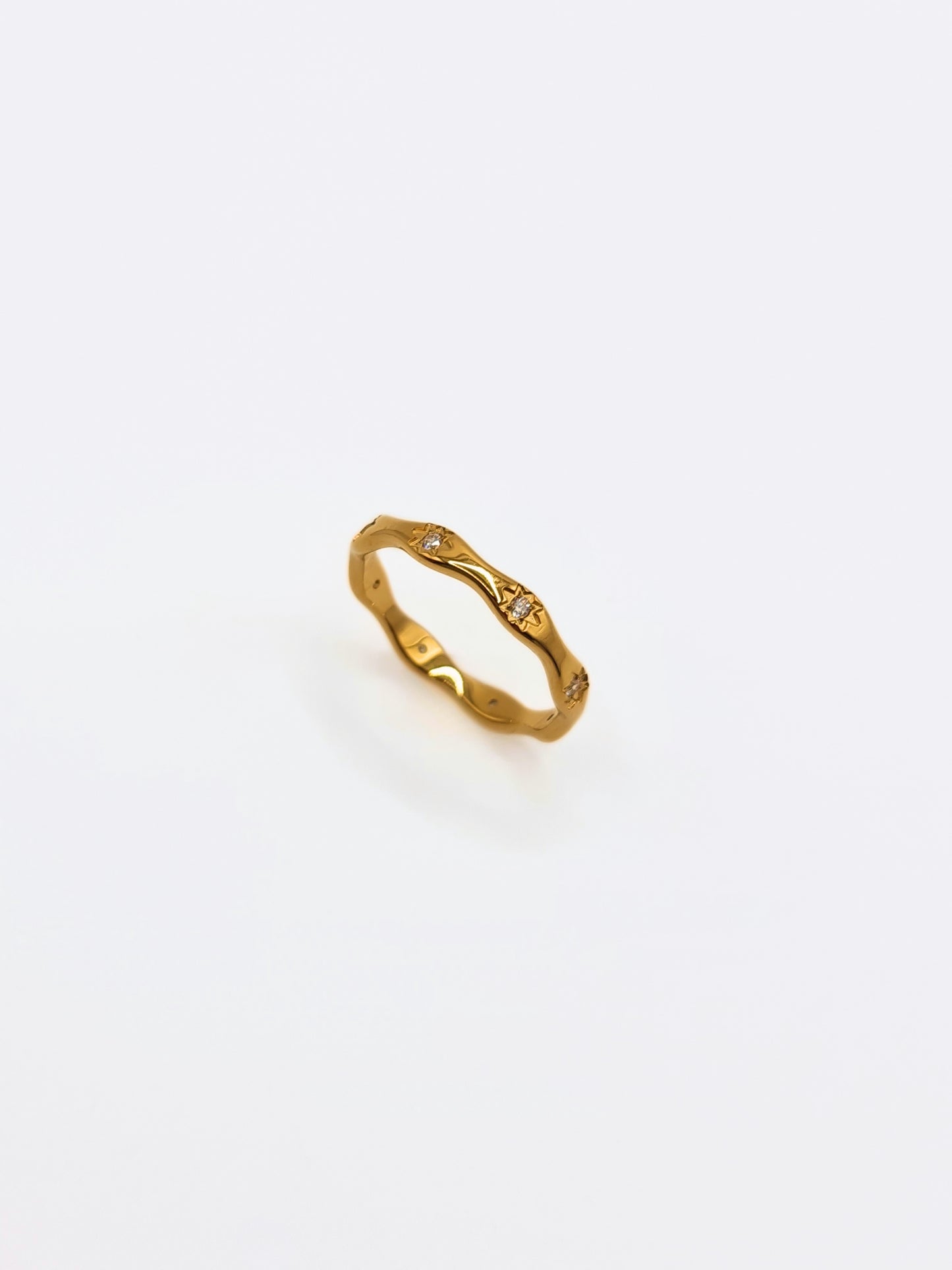 The Hope 18k Gold Plated Stainless Steel Crystal Celestial Wavy Ring.