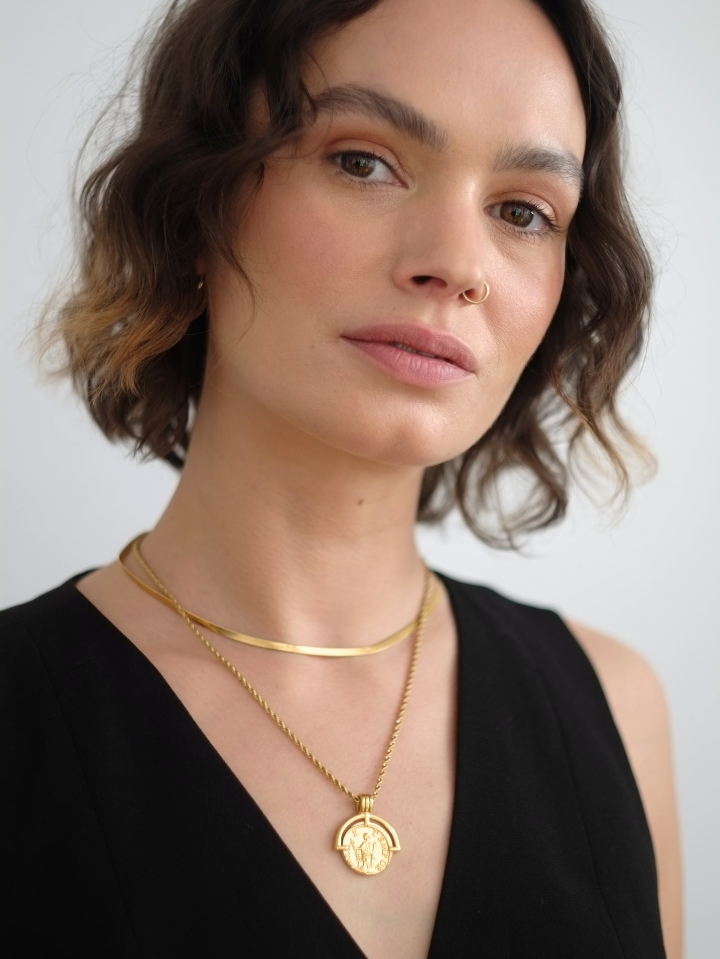 The Talisman Collection Coin & Snake Chain Necklace Set in 18k Gold Plated Stainless Steel.