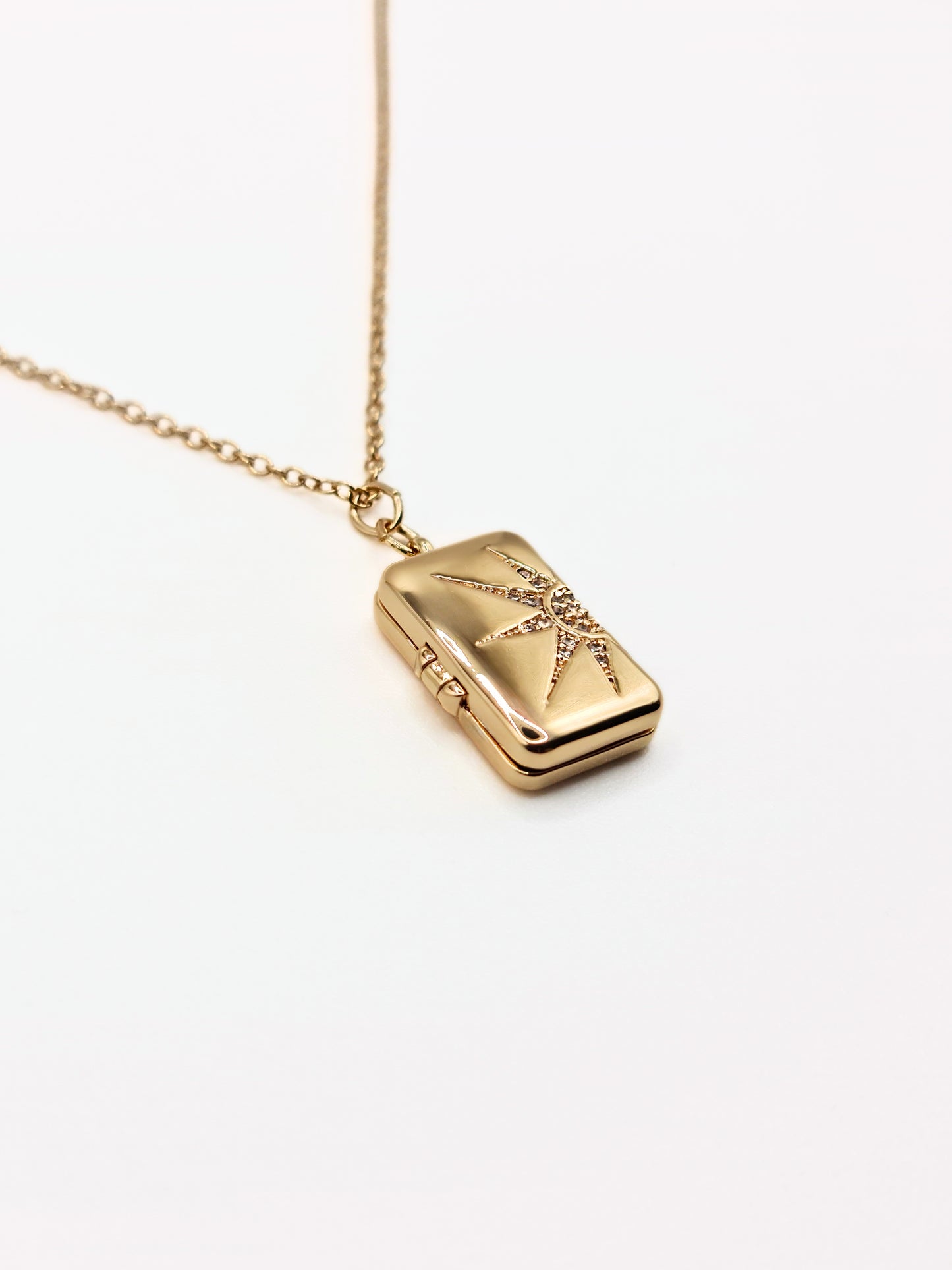 gold-crystal-celestial-star-locket-stainless-steel-tarnish-free-jewellery-waterproof-ember-and-stone-1