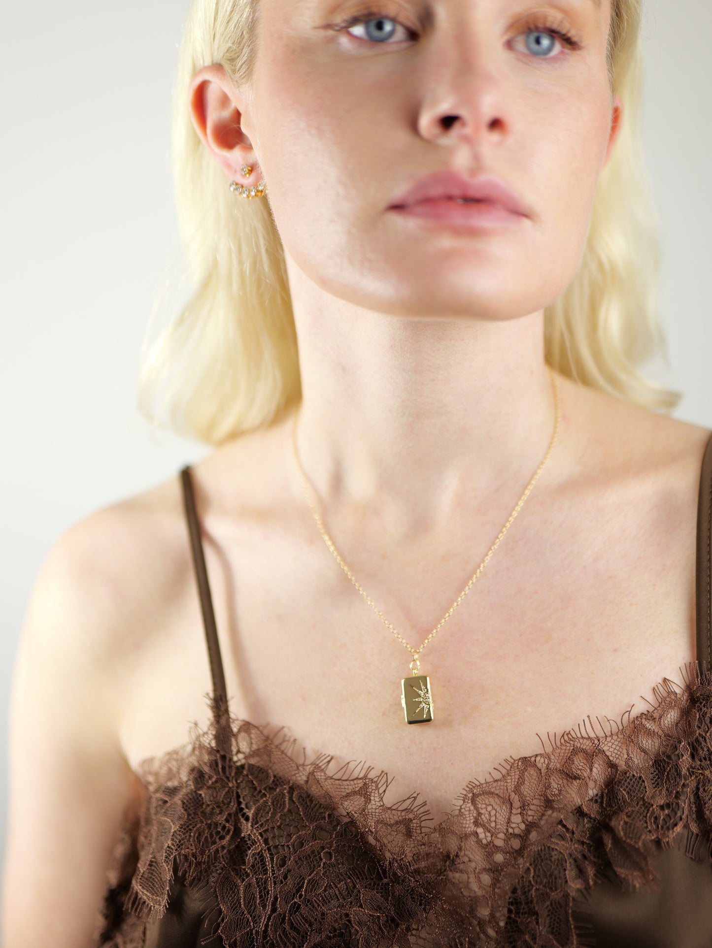 gold-crystal-celestial-star-locket-stainless-steel-tarnish-free-jewellery-waterproof-ember-and-stone-1