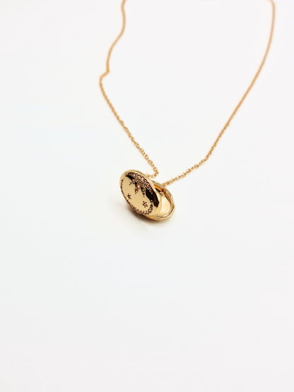 gold-crystal-celestial-star-oval-locket-stainless-steel-tarnish-free-jewellery-waterproof-ember-and-stone-1