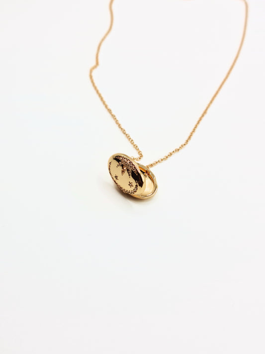 gold-crystal-celestial-star-oval-locket-stainless-steel-tarnish-free-jewellery-waterproof-ember-and-stone-1