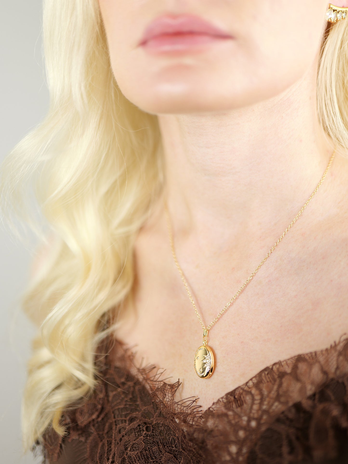 gold-crystal-celestial-star-oval-locket-stainless-steel-tarnish-free-jewellery-waterproof-ember-and-stone-1